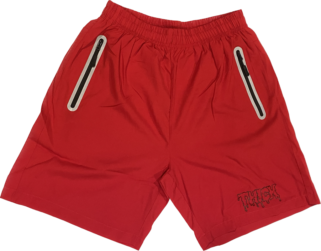 THICK performance shorts with reflective zipper pockets