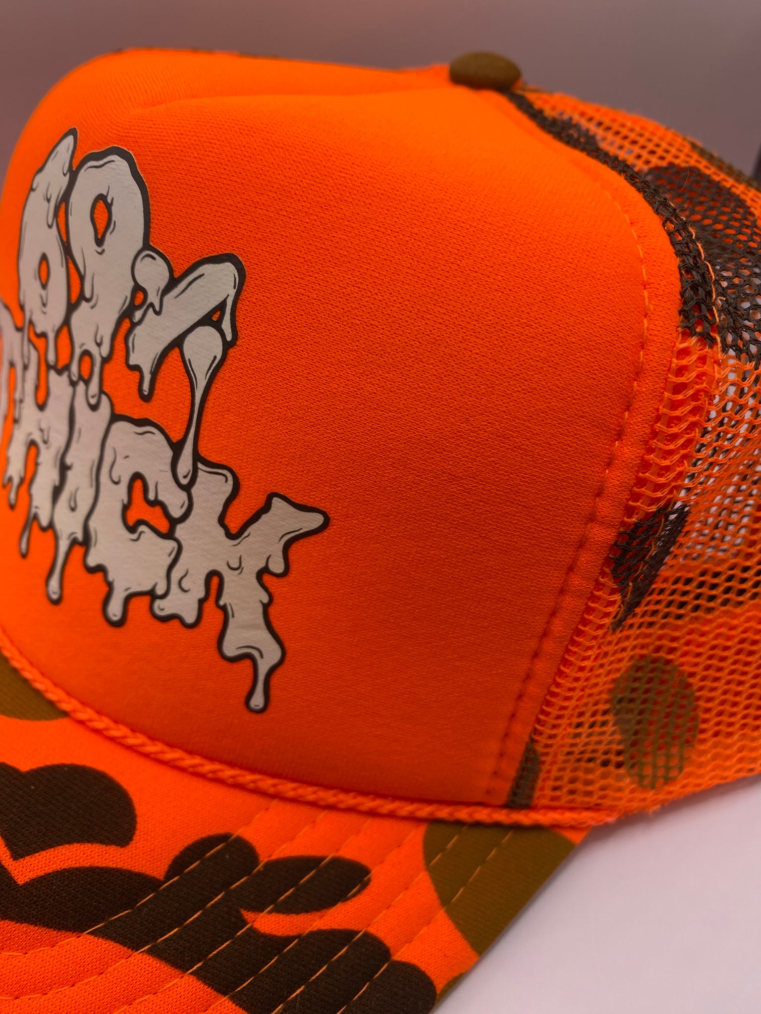 “69% THICK” 1 of 1 Orange Camo Trucker